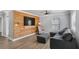 Modern living room features a wood accent wall and comfortable seating at 1560 Sarah M Harden Dr, Atlanta, GA 30311