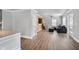 Spacious living room with wood accent wall, sleek furniture, and ample natural light at 1560 Sarah M Harden Dr, Atlanta, GA 30311
