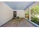 Carport with painted brick walls, light blue ceiling, and access to backyard at 2298 Pembrook Pl, Atlanta, GA 30324