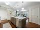 Open concept kitchen with an island featuring bar seating at 2298 Pembrook Pl, Atlanta, GA 30324
