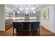 Modern kitchen features large island with seating, stainless steel appliances and white cabinetry at 2298 Pembrook Pl, Atlanta, GA 30324