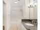Bathroom featuring granite countertop and a tub with subway tile surround at 2499 Peachtree Ne Rd # 503, Atlanta, GA 30305