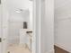 Clean bathroom with tile floors, bathtub with shower, and white cabinetry at 2499 Peachtree Ne Rd # 503, Atlanta, GA 30305