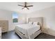 Bedroom with neutral tones, hardwood floors, and a large window providing natural light at 2499 Peachtree Ne Rd # 503, Atlanta, GA 30305