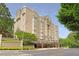 Exterior shot of a multi-story residential building with well-maintained landscaping at 2499 Peachtree Ne Rd # 503, Atlanta, GA 30305