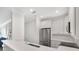 Bright kitchen featuring stainless steel appliances, white cabinetry, and a modern countertop with a sink at 2499 Peachtree Ne Rd # 503, Atlanta, GA 30305