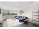 Stylish living room with ample seating, cityscape views, and chic decor, perfect for relaxation and entertainment at 2499 Peachtree Ne Rd # 503, Atlanta, GA 30305