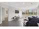 Inviting living room with large windows offering city views, complemented by stylish furniture and modern entertainment setup at 2499 Peachtree Ne Rd # 503, Atlanta, GA 30305