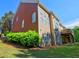 A multi-story house with a combination of brick and siding, offering ample natural light and outdoor space at 475 Vinings Estates Se Dr # A03, Smyrna, GA 30126