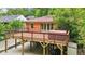 Spacious backyard deck with hot tub, perfect for outdoor entertaining and relaxation at 845 Stratford Rd, Avondale Estates, GA 30002