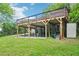 Exterior view of deck with hot tub overlooking the backyard at 845 Stratford Rd, Avondale Estates, GA 30002