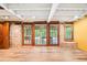Basement featuring new floors and multiple windows providing access to the backyard at 845 Stratford Rd, Avondale Estates, GA 30002