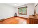 Bright bedroom featuring hardwood floors, natural light, and an antique vanity at 845 Stratford Rd, Avondale Estates, GA 30002
