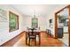 Charming dining room features hardwood floors, natural light, and seamlessly connects to the kitchen at 845 Stratford Rd, Avondale Estates, GA 30002