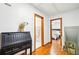 Hallway featuring hardwood floors and doors leading to the bathroom and the bedroom at 845 Stratford Rd, Avondale Estates, GA 30002