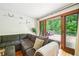 Cozy living room with comfortable seating and view of outdoor deck at 845 Stratford Rd, Avondale Estates, GA 30002