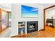 This living room features a cozy fireplace, built-in shelving, and direct access to the home's entryway at 845 Stratford Rd, Avondale Estates, GA 30002
