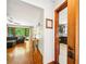Inviting living room flows to kitchen and deck with nature views at 845 Stratford Rd, Avondale Estates, GA 30002