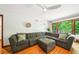 Comfortable living room with plush sectional and doors to wooden deck at 845 Stratford Rd, Avondale Estates, GA 30002