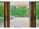 Spacious wooden deck with hot tub and lush green views at 845 Stratford Rd, Avondale Estates, GA 30002