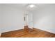 Bedroom with hardwood floors, a ceiling fan and a white trim at 1063 Manigault Se St, Atlanta, GA 30316
