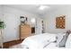 Bedroom with hardwood floors and a view into the bathroom at 1063 Manigault Se St, Atlanta, GA 30316