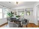 Bright dining area with decorative light fixture and an open floor plan; lots of natural light at 1063 Manigault Se St, Atlanta, GA 30316