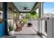 Delightful front porch with cozy furniture, a ceiling fan, and attractive decor, perfect for relaxing at 1063 Manigault Se St, Atlanta, GA 30316