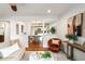 Bright living room featuring an open floor plan, hardwood floors, and stylish decor at 1063 Manigault Se St, Atlanta, GA 30316