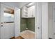 Mud room with built-in shelves and convenient access to the outside at 1063 Manigault Se St, Atlanta, GA 30316