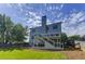 Multi-level deck and beautifully landscaped backyard is perfect for entertaining at 1892 Raven Hill Ne Dr, Atlanta, GA 30319