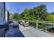 Outdoor deck features comfortable seating and a stylish rug for entertaining at 1892 Raven Hill Ne Dr, Atlanta, GA 30319