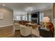 Spacious living room boasts stone fireplace, recessed lighting, and open layout at 1892 Raven Hill Ne Dr, Atlanta, GA 30319