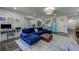 Cozy living area with a sectional, a mini fridge, a computer desk and a fun, stylish design at 1892 Raven Hill Ne Dr, Atlanta, GA 30319