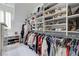 Spacious walk-in closet with custom shelving and abundant storage space at 1892 Raven Hill Ne Dr, Atlanta, GA 30319