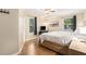 Relaxing bedroom with wood floors, natural light, and a cozy atmosphere at 3262 Bluff Rd, Marietta, GA 30062