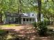 Rear exterior of the home showing a spacious backyard at 3262 Bluff Rd, Marietta, GA 30062