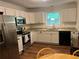 Well-lit kitchen featuring stainless steel appliances and light countertops at 3262 Bluff Rd, Marietta, GA 30062