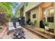 Charming backyard patio with outdoor seating, a barbecue grill, and green surroundings at 360 Parkview Manor Dr, Tucker, GA 30084
