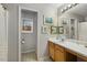 Traditional bathroom with a single vanity, a mirror, and art at 360 Parkview Manor Dr, Tucker, GA 30084