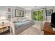 Inviting room with daybed, soft lighting, window with a view, accent chair, and decor at 360 Parkview Manor Dr, Tucker, GA 30084