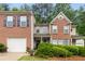 Charming brick home with manicured landscaping and a welcoming front entrance at 360 Parkview Manor Dr, Tucker, GA 30084