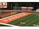 View of a vibrant green football field with 'Parkview' prominently displayed and visible stands at 360 Parkview Manor Dr, Tucker, GA 30084