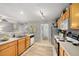 Traditional kitchen with light wood cabinets, stainless steel appliances, and bright lighting at 360 Parkview Manor Dr, Tucker, GA 30084