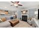 Comfortable living room featuring plush seating, fireplace, and neutral decor at 360 Parkview Manor Dr, Tucker, GA 30084