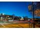 Street view featuring a variety of businesses and restaurants under a vibrant blue sky at dusk at 360 Parkview Manor Dr, Tucker, GA 30084