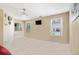 Empty room with neutral colored walls, ceiling fan, and carpeted floors at 4765 Smokestone Dr, Douglasville, GA 30135