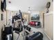 Home gym with workout equipment, neutral colored walls, and beach themed art at 4765 Smokestone Dr, Douglasville, GA 30135