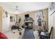 Well-equipped exercise room with treadmill, elliptical, and punching bag, ideal for a home fitness routine at 4765 Smokestone Dr, Douglasville, GA 30135
