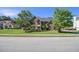 Beautiful two-story brick home with a well-manicured lawn and mature trees at 4765 Smokestone Dr, Douglasville, GA 30135